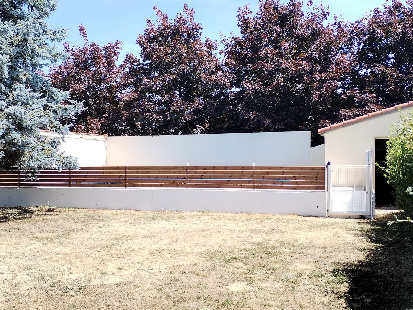 élagage paysagiste pose de clôture bois Saint-Herblain Nantes